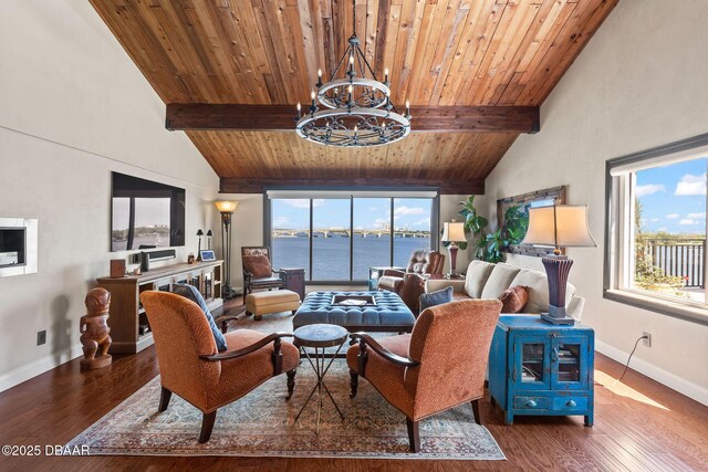 761 Marina Point Dr Unit 7610, Daytona Beach, FL 32114 - living room with beam ceiling, baseboards, an inviting chandelier, and wood finished floors