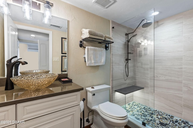 761 Marina Point Dr Unit 7610, Daytona Beach, FL 32114 - full bath with toilet, vanity, visible vents, and walk in shower
