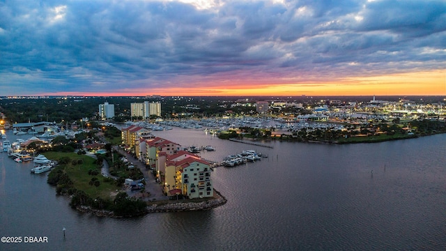 761 Marina Point Dr Unit 7610, Daytona Beach, FL 32114 - aerial view at dusk with a water view and a view of city