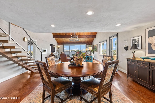 761 Marina Point Dr Unit 7610, Daytona Beach, FL 32114 - dining space with baseboards, wooden ceiling, dark wood-style flooring, a chandelier, and lofted ceiling