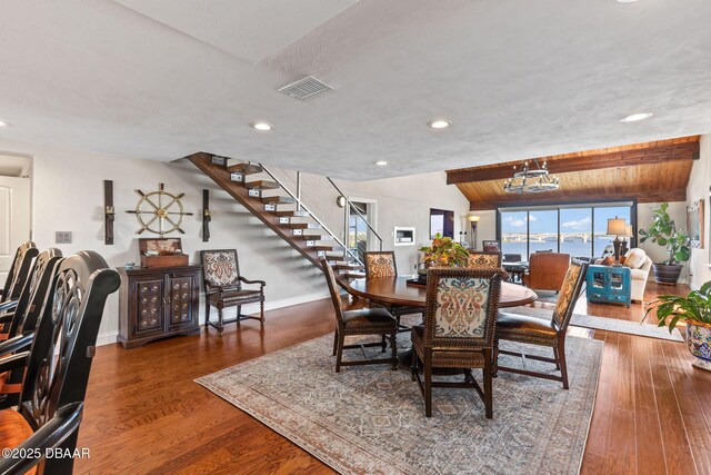 761 Marina Point Dr Unit 7610, Daytona Beach, FL 32114 - dining area featuring stairs, plenty of natural light, visible vents, and wood finished floors
