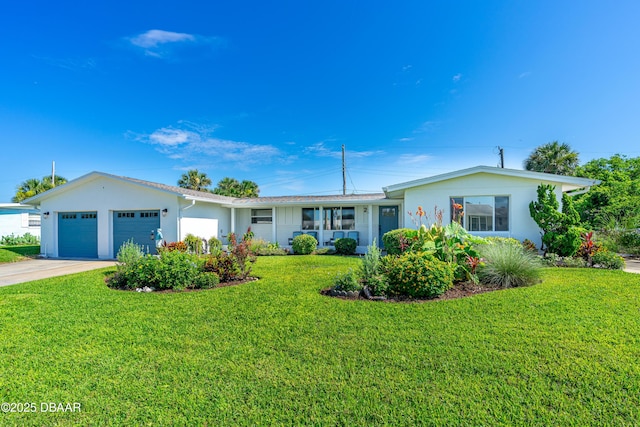23 Briggs Dr, Ormond Beach, FL 32176 - single story home with an attached garage, stucco siding, a front lawn, and driveway