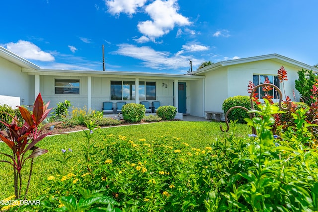 23 Briggs Dr, Ormond Beach, FL 32176 - ranch-style home with brick siding and a porch