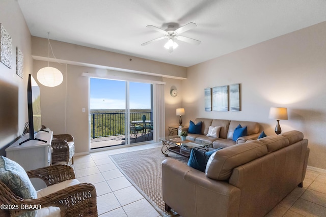 5300 S Atlantic Ave Unit 16-505, New Smyrna Beach, FL 32169 - living room featuring tile patterned floors and ceiling fan