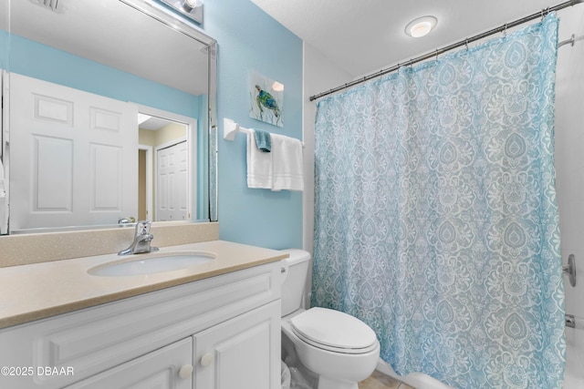 5300 S Atlantic Ave Unit 16-505, New Smyrna Beach, FL 32169 - bathroom featuring toilet and vanity
