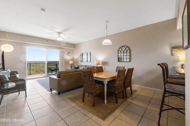 5300 S Atlantic Ave Unit 16-505, New Smyrna Beach, FL 32169 - dining room featuring ceiling fan and light tile patterned floors