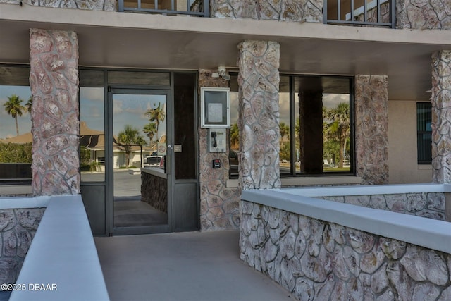 3370 Ocean Shore Blvd Unit 202B, Ormond Beach, FL 32176 - doorway to property featuring stone siding