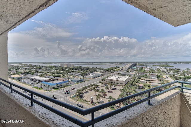 balcony featuring a water view