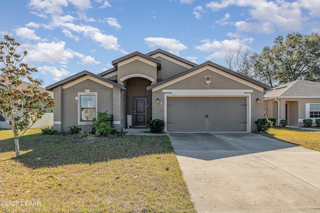 ranch-style house featuring a garage and a front lawn