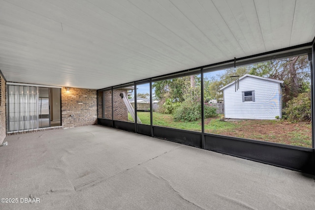 unfurnished sunroom with a wealth of natural light