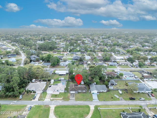 birds eye view of property with a residential view