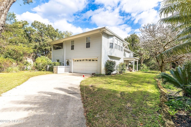 view of home's exterior with a garage and a lawn