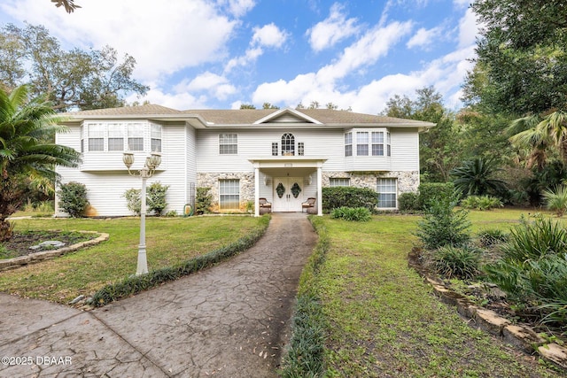 view of front of house with a front yard