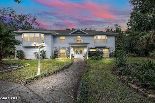 split foyer home with a yard