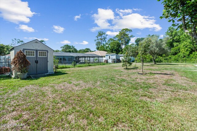 view of yard with a storage shed