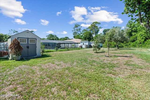 10 Falls Pl, Palm Coast, FL 32137 - view of yard with a storage unit and an outdoor structure