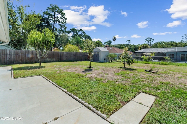 10 Falls Pl, Palm Coast, FL 32137 - view of yard featuring a shed, an outdoor structure, and a patio area