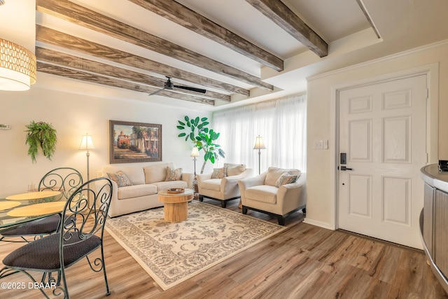92 S Orchard St, Ormond Beach, FL 32174 - living room with beamed ceiling, wood finished floors, and baseboards