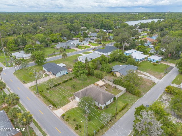 92 S Orchard St, Ormond Beach, FL 32174 - aerial perspective of suburban area featuring a forest and a large body of water