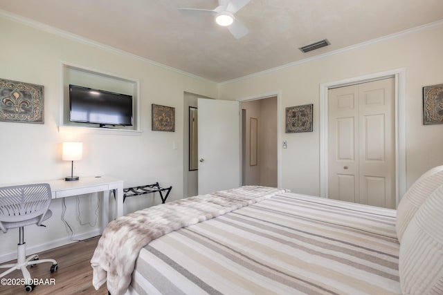 92 S Orchard St, Ormond Beach, FL 32174 - bedroom with wood finished floors, crown molding, ceiling fan, and an office area