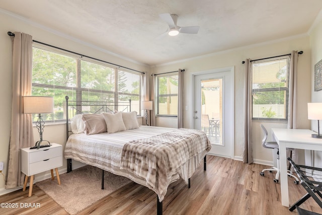 92 S Orchard St, Ormond Beach, FL 32174 - bedroom with light wood-style flooring, crown molding, access to outside, baseboards, and ceiling fan