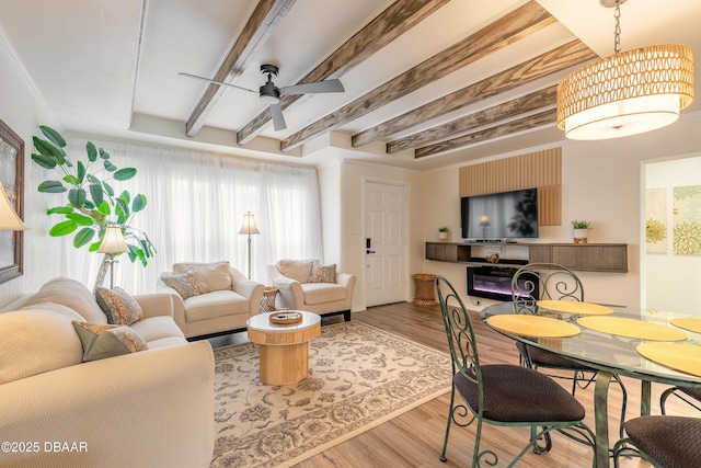 92 S Orchard St, Ormond Beach, FL 32174 - living area with a ceiling fan, beamed ceiling, and wood finished floors