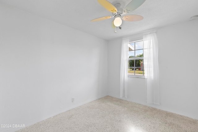 empty room featuring ceiling fan