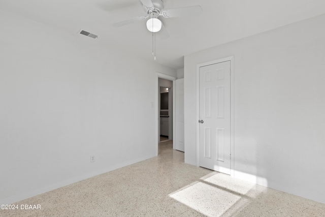 spare room featuring ceiling fan