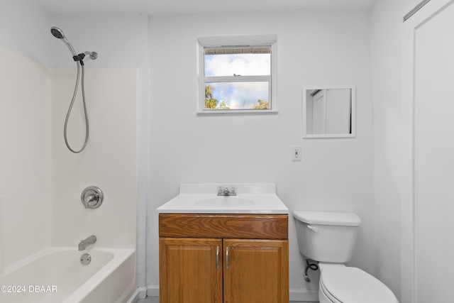 full bathroom with  shower combination, vanity, and toilet