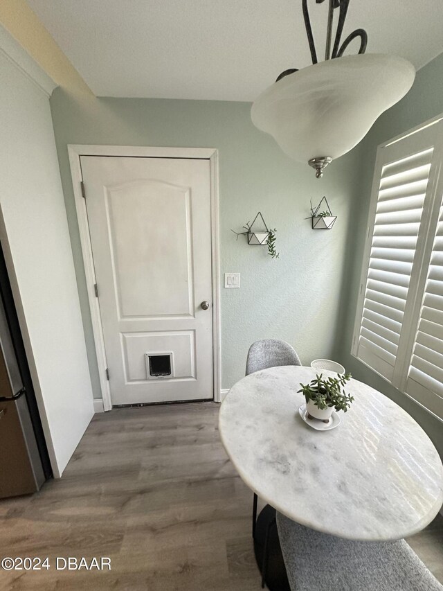 1021 Alabama Ave, Holly Hill, FL 32117 - dining space with wood finished floors