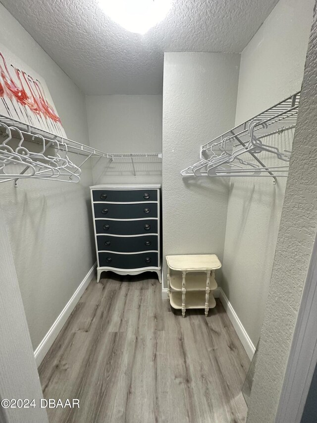 1021 Alabama Ave, Holly Hill, FL 32117 - walk in closet featuring wood finished floors