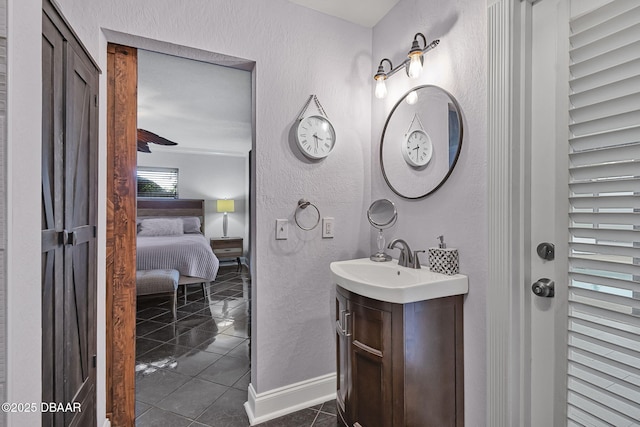 1409 Mollie Rd, Daytona Beach, FL 32114 - bathroom with a textured wall, vanity, and tile patterned flooring