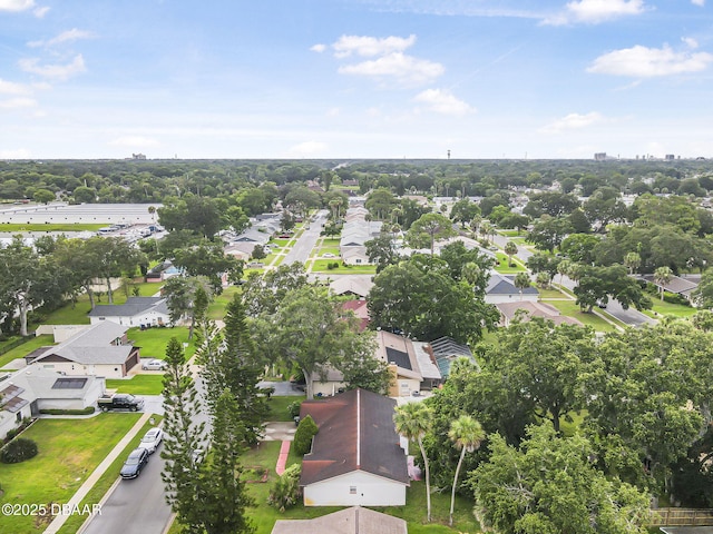 1409 Mollie Rd, Daytona Beach, FL 32114 - aerial perspective of suburban area with a tree filled landscape