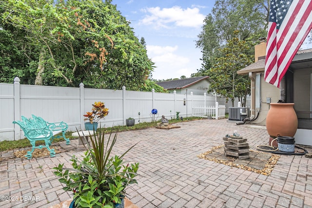 1409 Mollie Rd, Daytona Beach, FL 32114 - fenced backyard featuring a patio