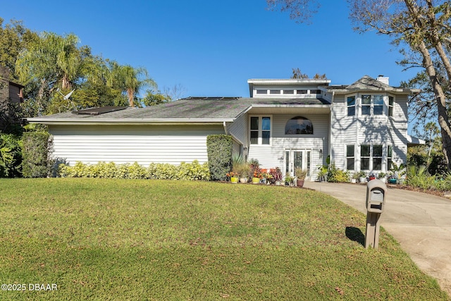 view of front of home with a front yard