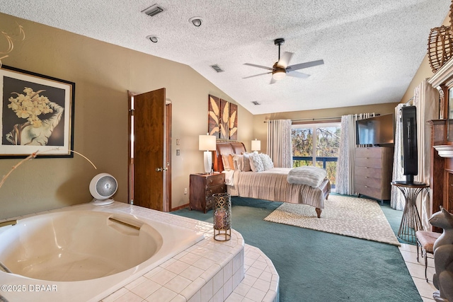 bedroom featuring ceiling fan, a textured ceiling, and vaulted ceiling