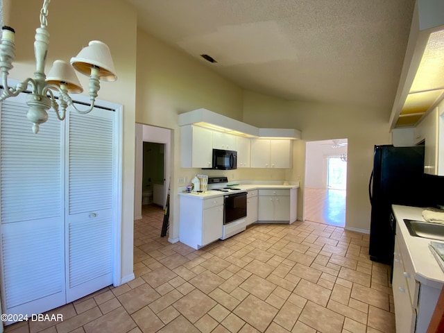 kitchen with black appliances, high vaulted ceiling, hanging light fixtures, a chandelier, and white cabinets