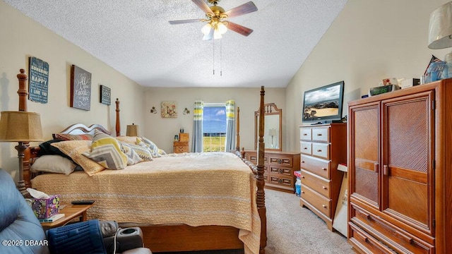 carpeted bedroom with a textured ceiling and ceiling fan