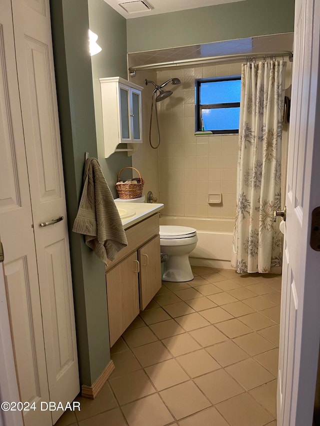 full bathroom featuring shower / bath combo, tile patterned flooring, vanity, and toilet