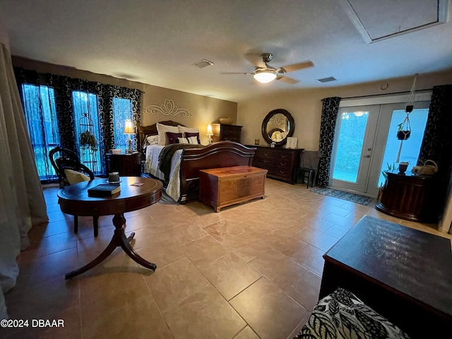 tiled bedroom featuring french doors, ceiling fan, and access to exterior