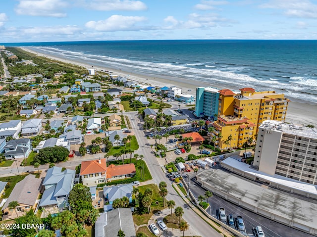 aerial view featuring a water view and a beach view