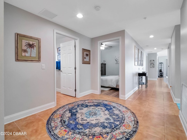 701 N Atlantic Ave Unit 202, New Smyrna Beach, FL 32169 - hallway with light tile patterned floors, recessed lighting, and baseboards