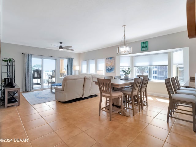 dining area featuring a wealth of natural light and light tile patterned flooring