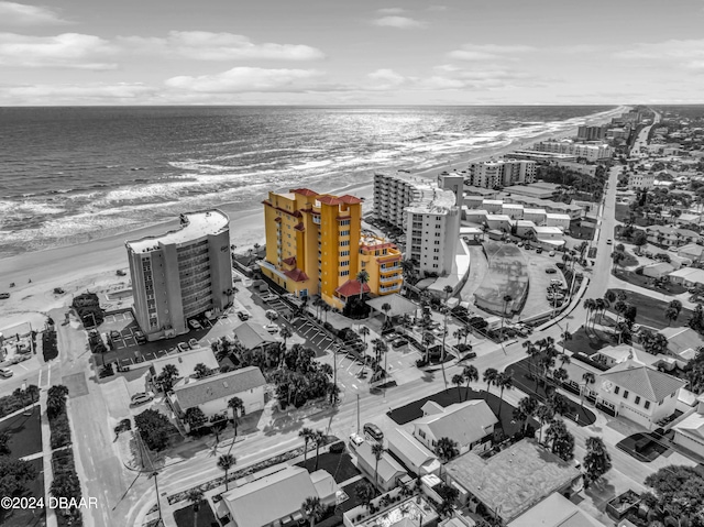 bird's eye view with a view of the beach and a water view