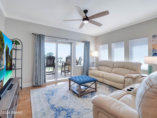 living room with ceiling fan, light tile patterned floors, and ornamental molding