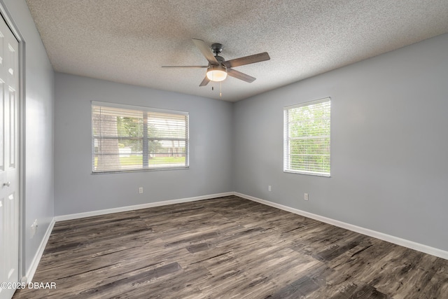 3643 Scott St, Port Orange, FL 32129 - spare room featuring wood finished floors, a ceiling fan, and a textured ceiling