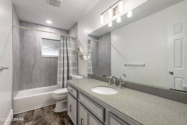 3643 Scott St, Port Orange, FL 32129 - full bathroom with vanity, shower / tub combo, and wood finished floors