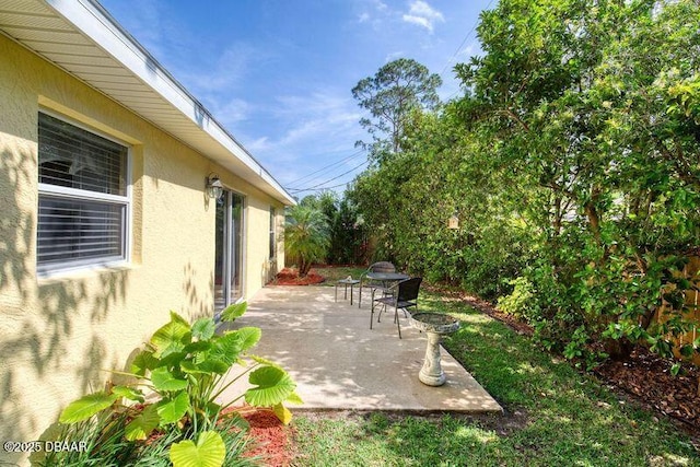 1465 Admiral Nimitz Ave, Daytona Beach, FL 32124 - view of yard featuring a patio