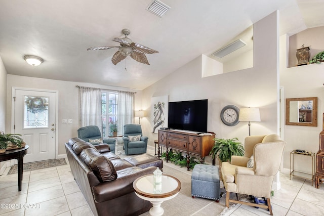 1465 Admiral Nimitz Ave, Daytona Beach, FL 32124 - living room featuring ceiling fan, vaulted ceiling, light tile patterned floors, and baseboards