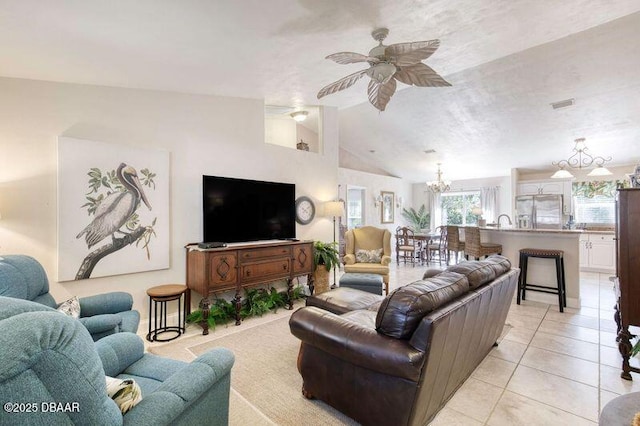 1465 Admiral Nimitz Ave, Daytona Beach, FL 32124 - living room with a chandelier, ceiling fan, lofted ceiling, and light tile patterned floors